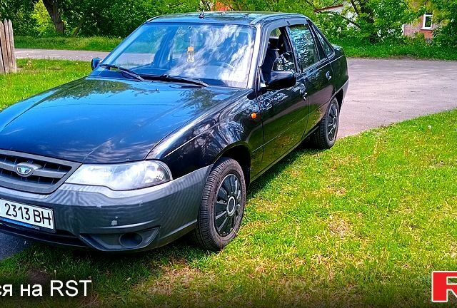 Чорний Деу Нексія, об'ємом двигуна 1.5 л та пробігом 249 тис. км за 1800 $, фото 1 на Automoto.ua
