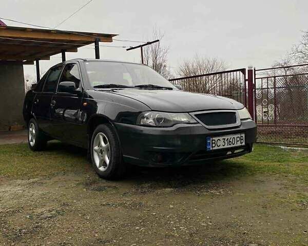 Черный Дэу Нексия, объемом двигателя 1.5 л и пробегом 252 тыс. км за 2300 $, фото 1 на Automoto.ua