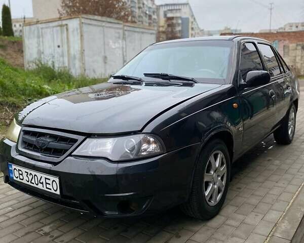 Черный Дэу Нексия, объемом двигателя 1.5 л и пробегом 184 тыс. км за 2350 $, фото 1 на Automoto.ua