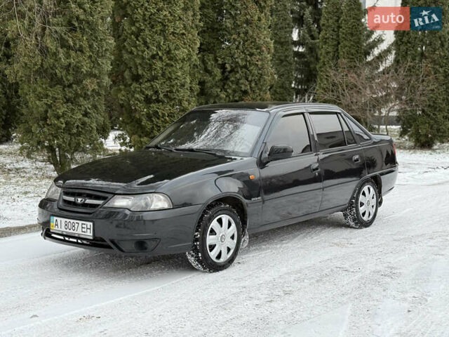 Черный Дэу Нексия, объемом двигателя 1.6 л и пробегом 128 тыс. км за 2850 $, фото 1 на Automoto.ua