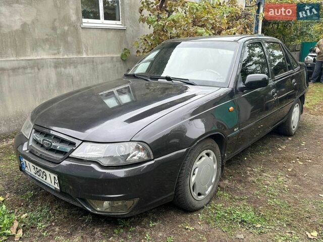Чорний Деу Нексія, об'ємом двигуна 1.6 л та пробігом 134 тис. км за 2999 $, фото 1 на Automoto.ua