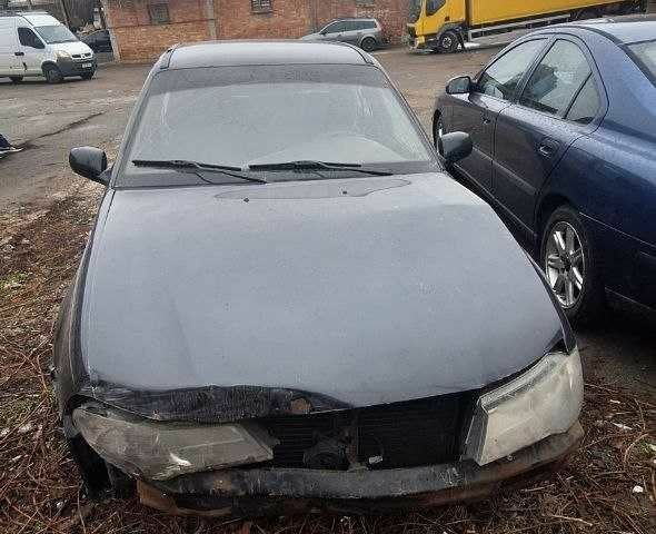 Черный Дэу Нексия, объемом двигателя 0 л и пробегом 220 тыс. км за 587 $, фото 1 на Automoto.ua