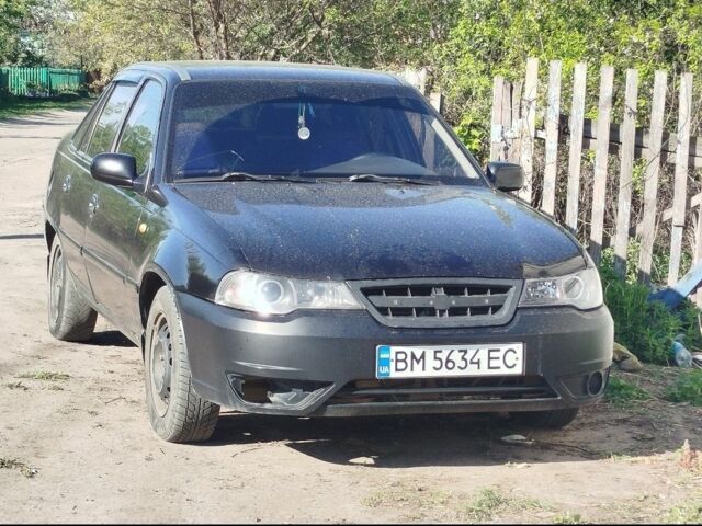 Черный Дэу Нексия, объемом двигателя 1.5 л и пробегом 220 тыс. км за 2000 $, фото 1 на Automoto.ua