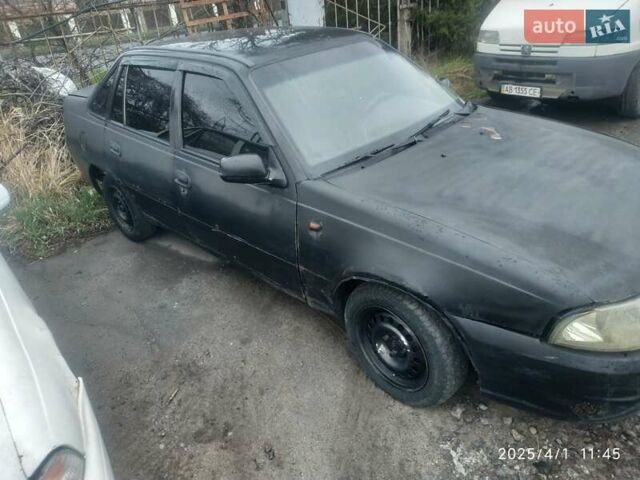 Черный Дэу Нексия, объемом двигателя 1.6 л и пробегом 236 тыс. км за 850 $, фото 1 на Automoto.ua