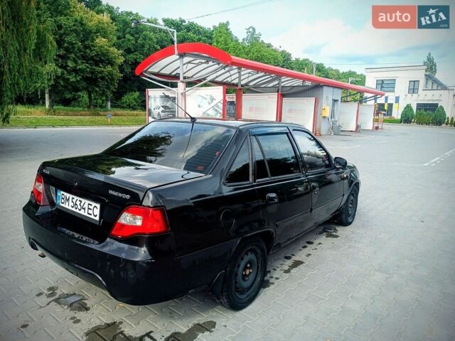 Чорний Деу Нексія, об'ємом двигуна 1.5 л та пробігом 220 тис. км за 1600 $, фото 1 на Automoto.ua