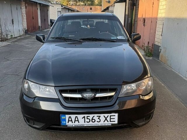 Чорний Деу Нексія, об'ємом двигуна 1.6 л та пробігом 149 тис. км за 3800 $, фото 1 на Automoto.ua
