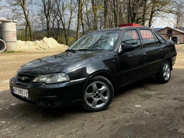 Чорний Деу Нексія, об'ємом двигуна 1.5 л та пробігом 259 тис. км за 1900 $, фото 1 на Automoto.ua