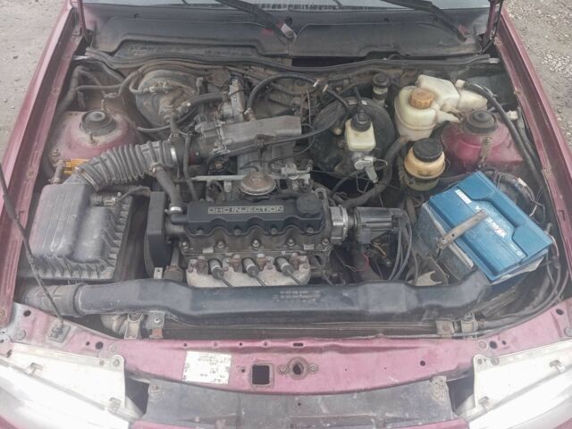 Червоний Деу Нексія, об'ємом двигуна 1.5 л та пробігом 233 тис. км за 1750 $, фото 1 на Automoto.ua