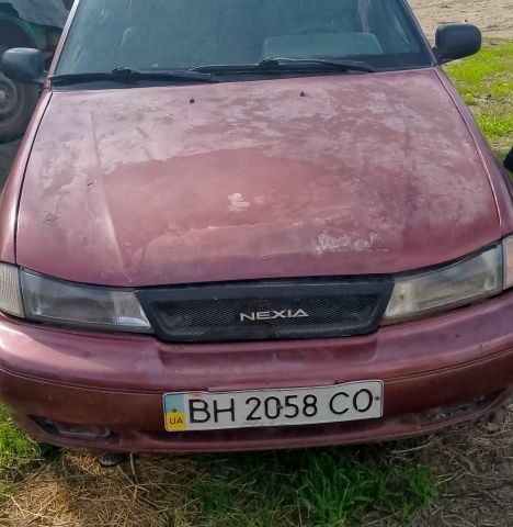 Дэу Нексия 1995 в Херсоне на Automoto.ua Красный Дэу Нексия, объемом двигателя 0 л и пробегом 256 тыс. км за 648 $, фото 1 на Automoto.ua