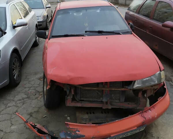 Червоний Деу Нексія, об'ємом двигуна 1.5 л та пробігом 140 тис. км за 450 $, фото 1 на Automoto.ua