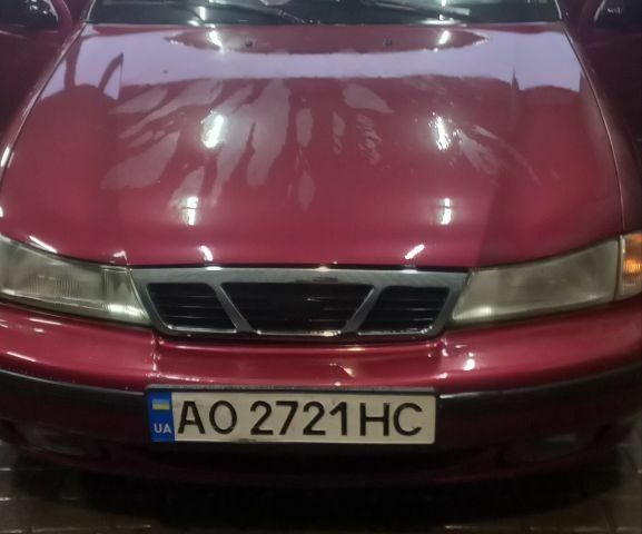 Червоний Деу Нексія, об'ємом двигуна 1 л та пробігом 270 тис. км за 2500 $, фото 1 на Automoto.ua