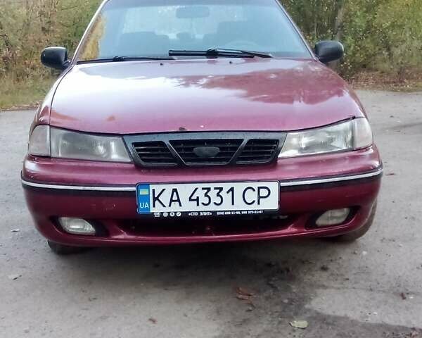 Красный Дэу Нексия, объемом двигателя 1.5 л и пробегом 266 тыс. км за 1000 $, фото 1 на Automoto.ua