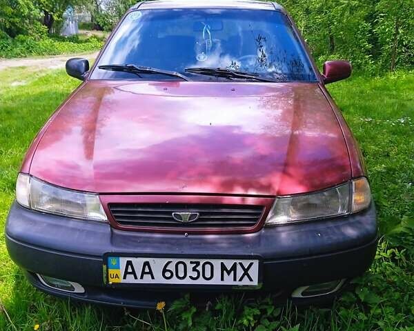 Червоний Деу Нексія, об'ємом двигуна 1.6 л та пробігом 373 тис. км за 1600 $, фото 1 на Automoto.ua
