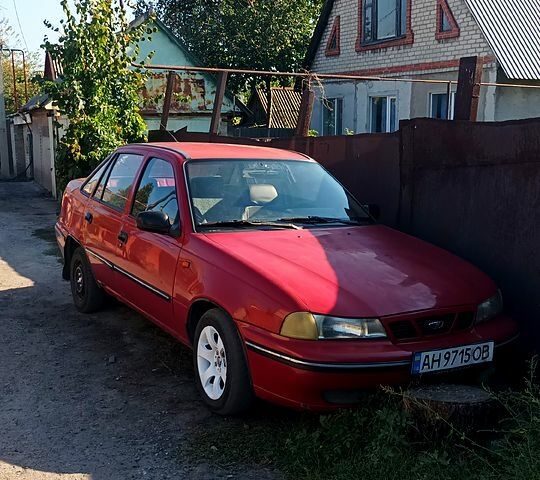 Червоний Деу Нексія, об'ємом двигуна 1.5 л та пробігом 186 тис. км за 830 $, фото 1 на Automoto.ua
