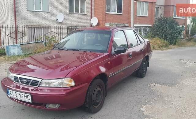 Червоний Деу Нексія, об'ємом двигуна 1.5 л та пробігом 170 тис. км за 1811 $, фото 1 на Automoto.ua