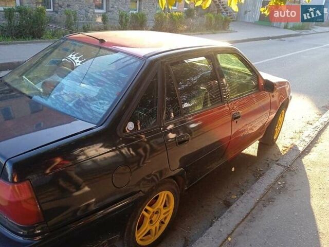 Червоний Деу Нексія, об'ємом двигуна 1.5 л та пробігом 200 тис. км за 2000 $, фото 1 на Automoto.ua