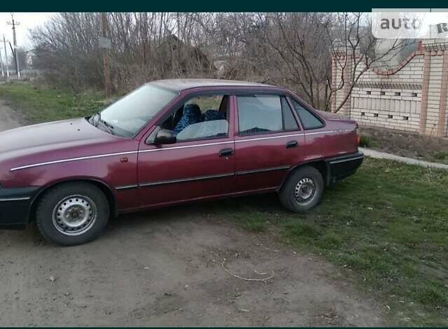 Червоний Деу Нексія, об'ємом двигуна 1.5 л та пробігом 325 тис. км за 1550 $, фото 1 на Automoto.ua