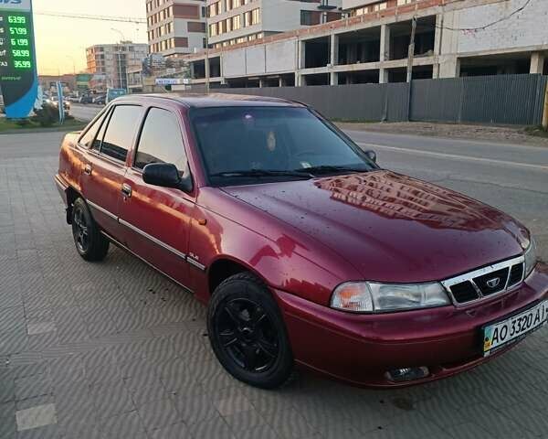 Червоний Деу Нексія, об'ємом двигуна 1.5 л та пробігом 197 тис. км за 1300 $, фото 1 на Automoto.ua