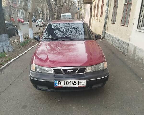 Червоний Деу Нексія, об'ємом двигуна 1.5 л та пробігом 141 тис. км за 1800 $, фото 1 на Automoto.ua