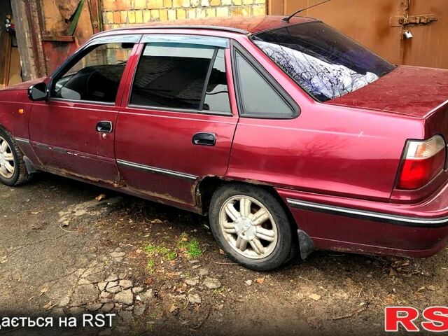 Красный Дэу Нексия, объемом двигателя 1.5 л и пробегом 245 тыс. км за 701 $, фото 1 на Automoto.ua