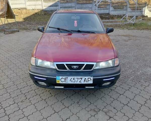 Червоний Деу Нексія, об'ємом двигуна 1.5 л та пробігом 168 тис. км за 900 $, фото 1 на Automoto.ua