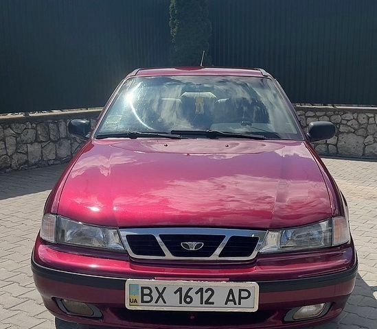 Червоний Деу Нексія, об'ємом двигуна 1.5 л та пробігом 126 тис. км за 2400 $, фото 1 на Automoto.ua