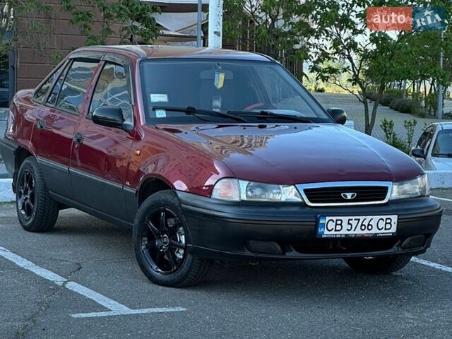 Красный Дэу Нексия, объемом двигателя 1.5 л и пробегом 218 тыс. км за 1999 $, фото 1 на Automoto.ua
