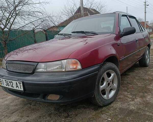 Червоний Деу Нексія, об'ємом двигуна 1.5 л та пробігом 111 тис. км за 1400 $, фото 1 на Automoto.ua