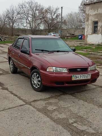 Червоний Деу Нексія, об'ємом двигуна 1.5 л та пробігом 187 тис. км за 2200 $, фото 1 на Automoto.ua