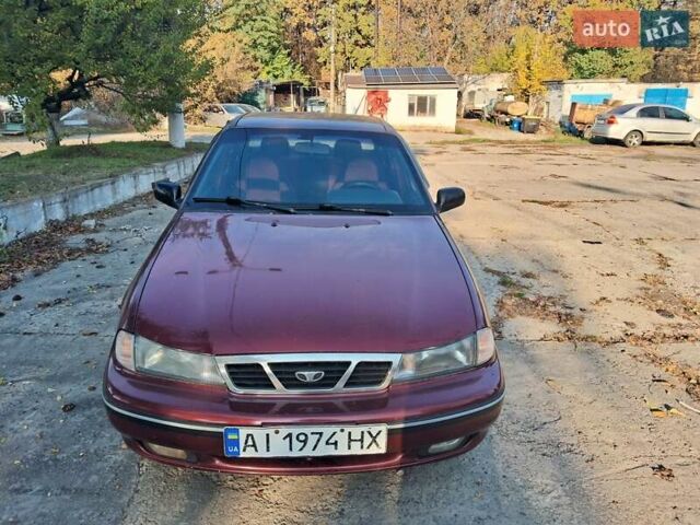 Красный Дэу Нексия, объемом двигателя 1.5 л и пробегом 245 тыс. км за 2000 $, фото 1 на Automoto.ua