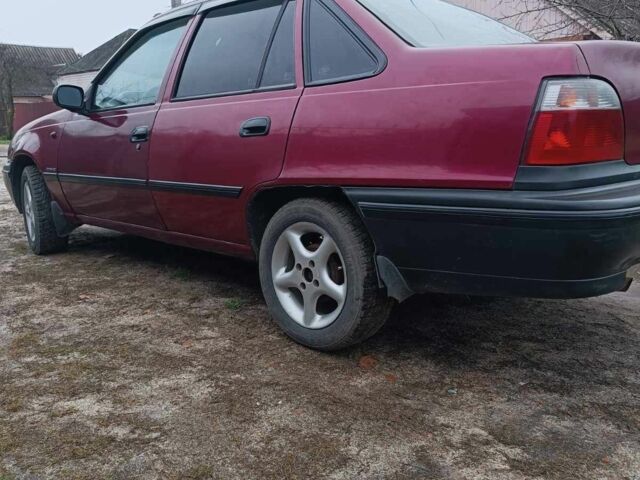 Червоний Деу Нексія, об'ємом двигуна 1.5 л та пробігом 111 тис. км за 1400 $, фото 1 на Automoto.ua