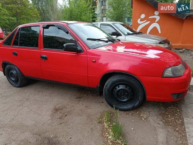 Червоний Деу Нексія, об'ємом двигуна 1.6 л та пробігом 185 тис. км за 1900 $, фото 1 на Automoto.ua