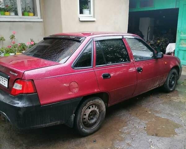 Червоний Деу Нексія, об'ємом двигуна 1.5 л та пробігом 250 тис. км за 1300 $, фото 1 на Automoto.ua