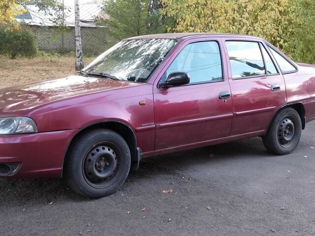 Червоний Деу Нексія, об'ємом двигуна 1.6 л та пробігом 203 тис. км за 2500 $, фото 1 на Automoto.ua