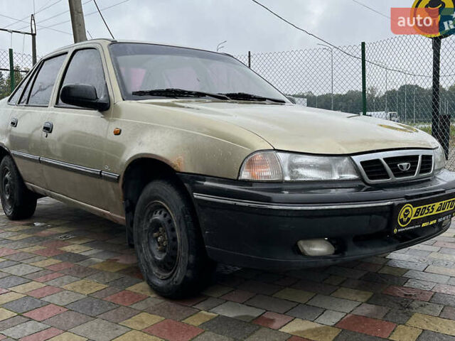 Жовтий Деу Нексія, об'ємом двигуна 1.5 л та пробігом 450 тис. км за 1500 $, фото 1 на Automoto.ua