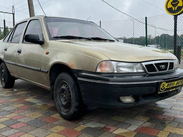 Жовтий Деу Нексія, об'ємом двигуна 1.5 л та пробігом 450 тис. км за 1500 $, фото 1 на Automoto.ua