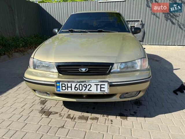 Желтый Дэу Нексия, объемом двигателя 1.5 л и пробегом 170 тыс. км за 1400 $, фото 1 на Automoto.ua