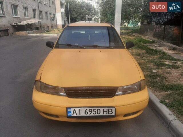 Желтый Дэу Нексия, объемом двигателя 1.5 л и пробегом 245 тыс. км за 500 $, фото 1 на Automoto.ua