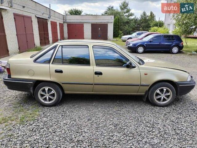 Жовтий Деу Нексія, об'ємом двигуна 1.5 л та пробігом 65 тис. км за 2600 $, фото 1 на Automoto.ua