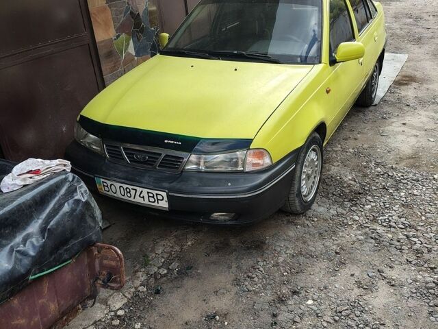 Жовтий Деу Нексія, об'ємом двигуна 1.5 л та пробігом 180 тис. км за 1200 $, фото 1 на Automoto.ua