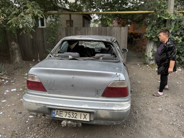 Сірий Деу Нексія, об'ємом двигуна 1.5 л та пробігом 230 тис. км за 402 $, фото 1 на Automoto.ua