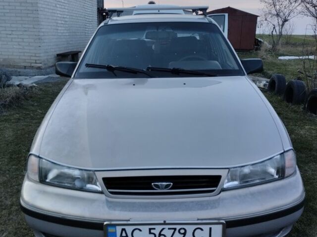 Сірий Деу Нексія, об'ємом двигуна 1.5 л та пробігом 215 тис. км за 1350 $, фото 1 на Automoto.ua