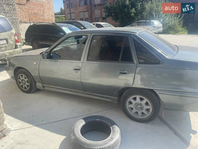 Сірий Деу Нексія, об'ємом двигуна 1.5 л та пробігом 284 тис. км за 1300 $, фото 1 на Automoto.ua