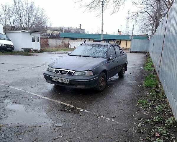 Сірий Деу Нексія, об'ємом двигуна 1.5 л та пробігом 300 тис. км за 450 $, фото 1 на Automoto.ua