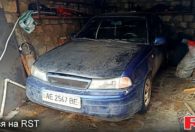 Серый Дэу Нексия, объемом двигателя 1.5 л и пробегом 320 тыс. км за 700 $, фото 1 на Automoto.ua