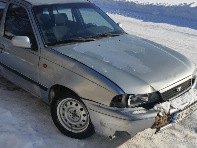 Серый Дэу Нексия, объемом двигателя 1.5 л и пробегом 250 тыс. км за 1010 $, фото 1 на Automoto.ua