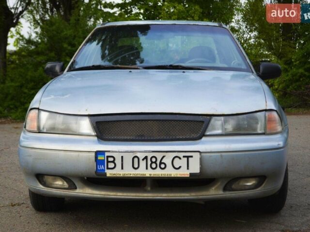 Сірий Деу Нексія, об'ємом двигуна 1.6 л та пробігом 349 тис. км за 612 $, фото 1 на Automoto.ua