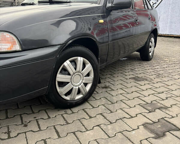 Сірий Деу Нексія, об'ємом двигуна 1.5 л та пробігом 285 тис. км за 1600 $, фото 1 на Automoto.ua