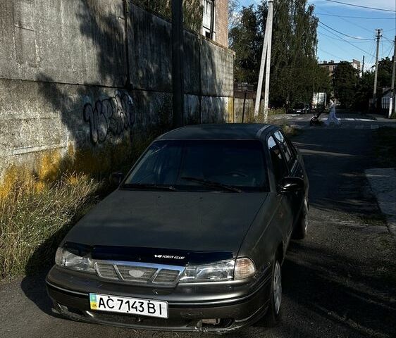 Сірий Деу Нексія, об'ємом двигуна 1.5 л та пробігом 210 тис. км за 560 $, фото 1 на Automoto.ua