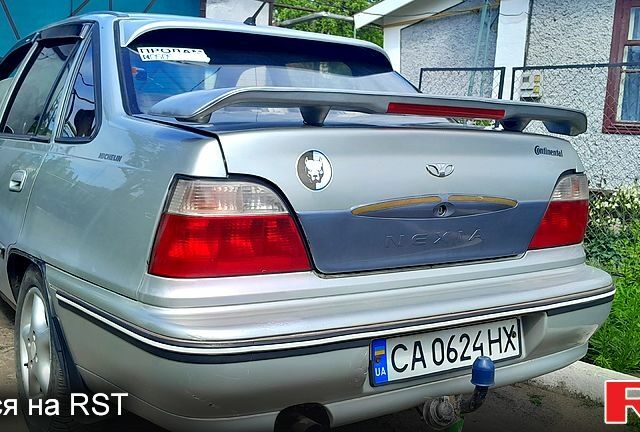 Сірий Деу Нексія, об'ємом двигуна 1.5 л та пробігом 250 тис. км за 1299 $, фото 1 на Automoto.ua